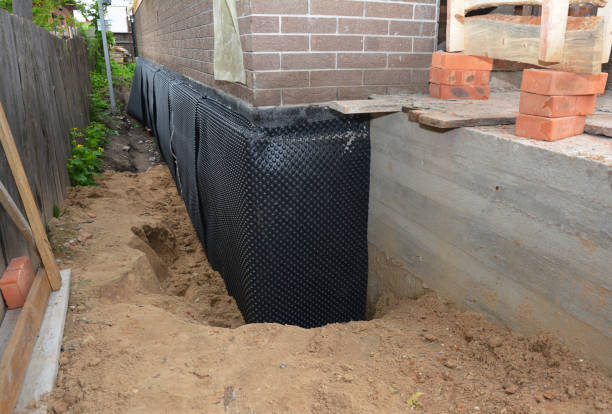 Happy homeowners after waterproofing job in Williamsport